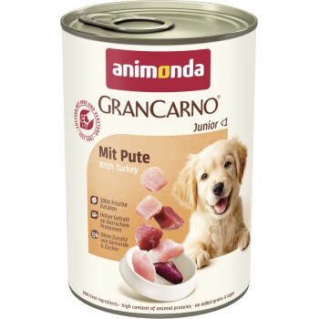 Dose Animonda GranCarno Junior Hundefutter mit Truthahn, zeigt frische Fleischstücke und einen Hund auf dem Etikett.